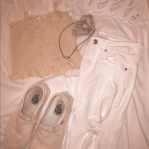 white ripped denim jeans